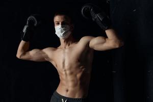guy in medical mask athlete nude torso bodybuilder photo