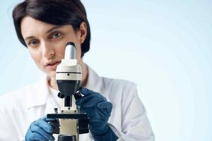 woman scientist biotechnology research microscope technology photo