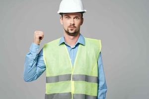 man reflective vest Professional Job light background photo