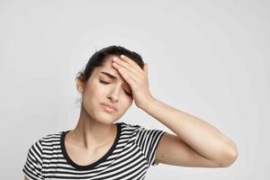 woman headache painful syndrome discomfort isolated background photo