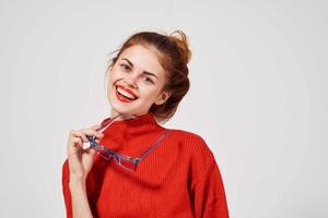 portrait of a woman in a red sweater Lifestyle isolated background photo