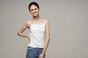 cheerful woman pulls herself up in a health jersey photo