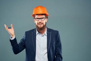 Man in safety suit orange helmet construction industry professional photo