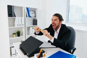 Man emotions work office desk boss photo
