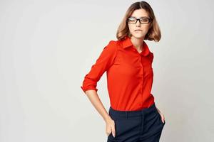 woman in red shirt official documents office manager photo