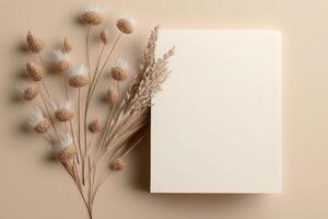 White paper empty blank dried grass decoration on beige. Illustration photo