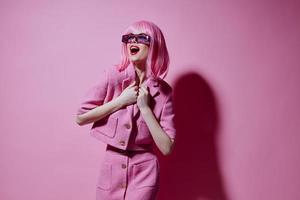 Portrait of a charming lady gestures with his hands with a pink jacket unaltered photo