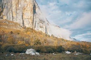 high mountains landscape rocks autumn adventure fresh air photo