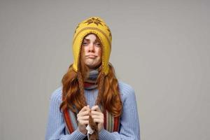 red-haired woman cold handkerchief close-up photo