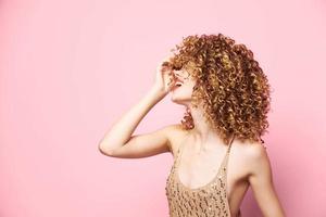Blond woman Copy Space sequin dress curly hair photo