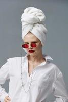 fashionable woman with a towel on his head in a white shirt Lifestyle posing photo