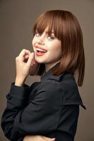 Beautiful lady European appearance black coat cropped view photo