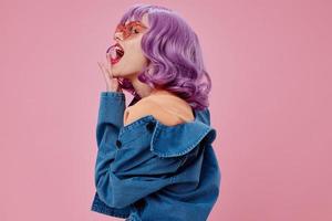 Beauty Fashion woman purple hair fashion glasses denim clothing pink background unaltered photo