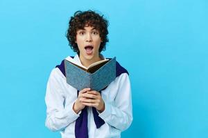 curly guy with a book college learning jacket isolated backgrounds photo