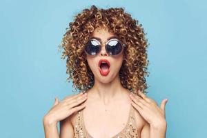 Pretty woman Surprise Open your mouth sunglasses fun curly hair photo