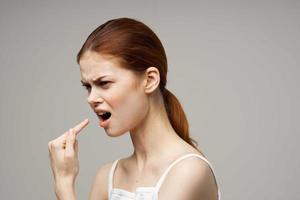 disgruntled woman toothache health problems disorder studio treatment photo