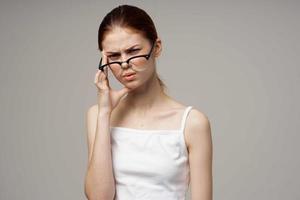 disgruntled woman vision problems myopia isolated background photo