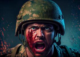 A soldier in a helmet screams in a rage. The man's face is in the blood. photo