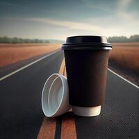 Coffee to go on the background of the road. Illustration photo