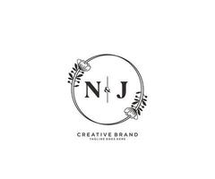 initial NJ letters hand drawn feminine and floral botanical logo suitable for spa salon skin hair beauty boutique and cosmetic company. vector