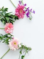 japanese dianthus, gerbera, matthiola and laurel photo