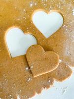 The process of cooking heart cookies. Top view raw photo