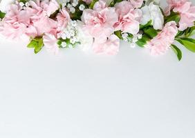 Close up photo of a bouquet of pink and white