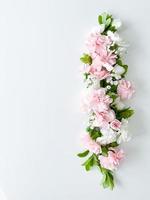 Beautiful delicate blooming floral frame of pink photo