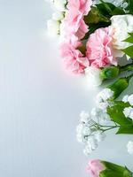 Close up photo of a bouquet of pink and white