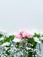 Close up photo of a bouquet of pink and white