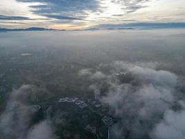 Aerial view Kuala Lumpur in natural morning fog photo