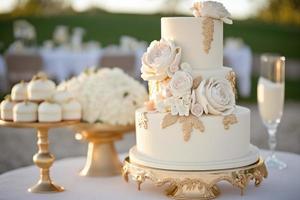 Wedding cake with flower details on a tableWhat does wedding cake mean photo