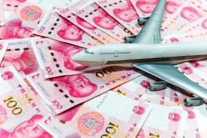 Yuan or RMB, Chinese Currency and airplane photo