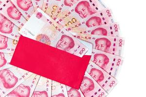 Yuan or RMB, Chinese Currency with red envelope photo