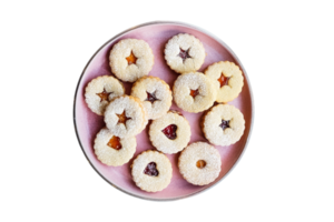 Pink plate with cookies isolated on a transparent background png