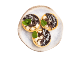 White plate with desserts isolated on a transparent background png