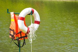 Life jackets and floats save life by the water and the scenery in Queen Garden Park in Bangkok, Thailand. photo