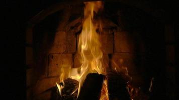 Smouldering coals in a fireplace. Slow motion video