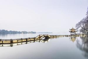 beautiful hangzhou in  winter and ancient pavilion photo