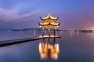 beautiful hangzhou twilight time and ancient pavilion photo