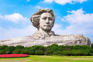 CHANGSHA, CHINA - OCT 29, 2017-Youth Mao Zedong Statue is located in Orange Isle, Changsha, Hunan, China. The monument stands 32 metres tall. photo