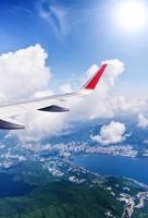 Wing of an airplane flying in the sky photo