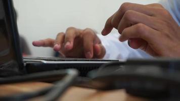 Man hand typing on a laptop keyboard. Businessman hands busy working on laptop. student professional study work with pc software technology concept. video