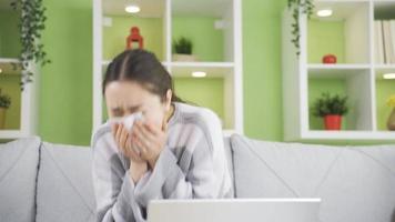 Young woman with flu sneezing. Sick woman. Young asian woman covering her mouth with a tissue while sneezing. Flu and Cold. video