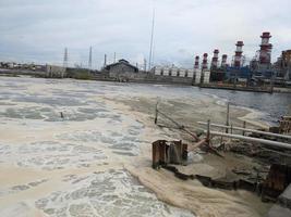 Foaming sea water on the outfall coal fired power plant. The photo is suitable to use for waste water poster, power plant activity and environment content media.