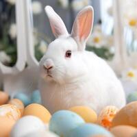 White Easter Bunny with colorful eggs photo