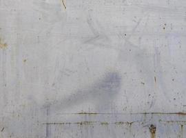 Full frame Background texture of old rusty blue sheet metal photo
