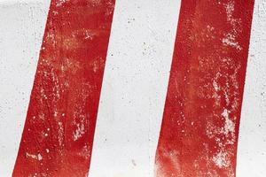 Concrete white wall with red paint background or texture photo