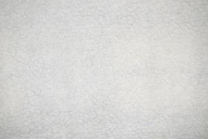 White fur with a texture of fibers. Pattern soft canvas for various purposes photo