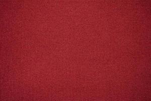simple red background texture of canvas close up photo